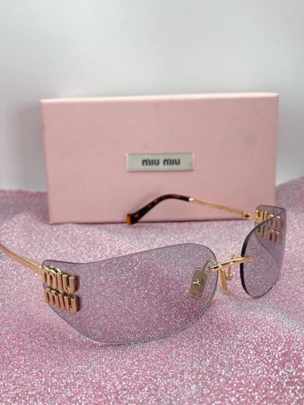 Miu Miu Gold Sunglasses with Gray Lenses